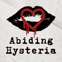 Crumpled paper background with black lipstick imprint and a red bleeding heart over top with the words "Abiding Hysteria" below in black with red shadow